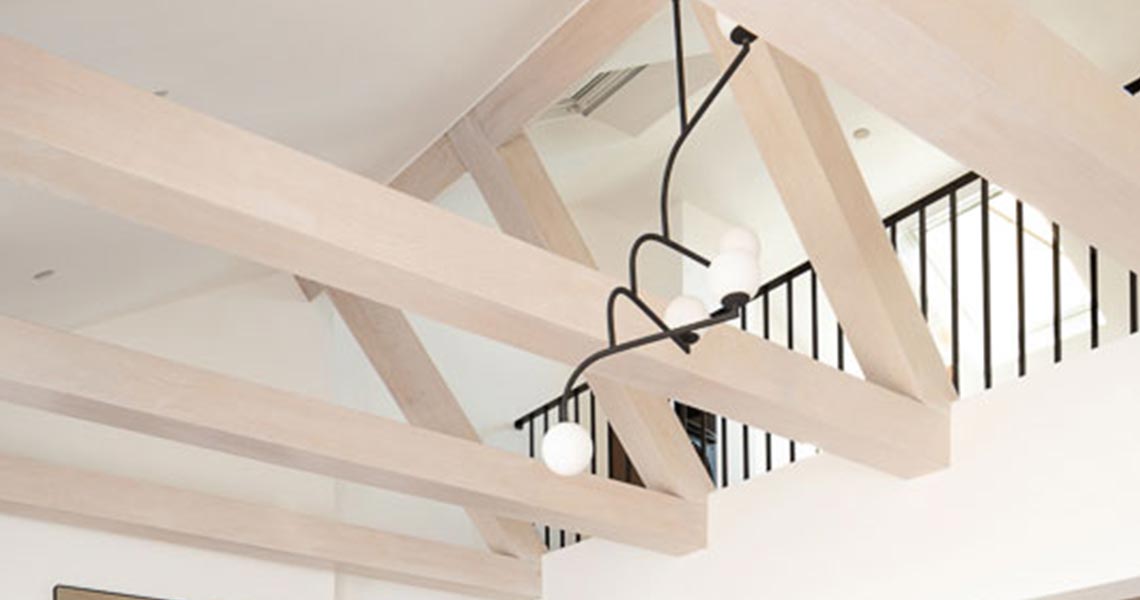 Modern open-plan dining area with garden views in London home