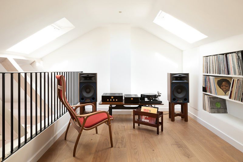 Bespoke floor-to-ceiling bookshelves and library shelving built into a Chiswick W4 living room